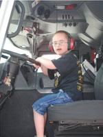 Boy in vehicle