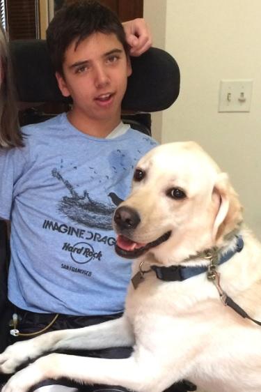 Samuel and his service dog, Proton